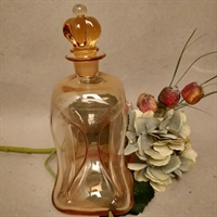 abrikosfarvet klukflaske med glasprop gammel snapseflaske genbrug